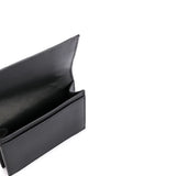 Close-up of Bottega Veneta wallets hardware and fine stitching