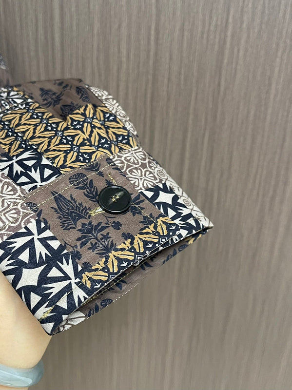 Side profile of Louis Vuitton luxury clothing with logo-detail design