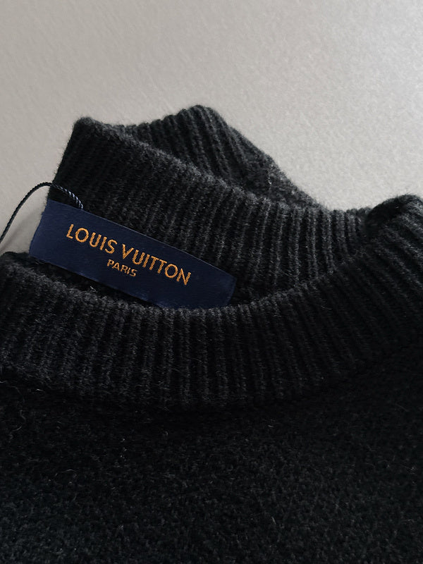 Front view of Louis Vuitton luxury clothing with signature branding