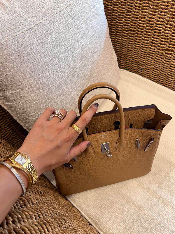 Sculpted handbag styled for everyday wear