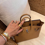 Sculpted handbag styled for everyday wear