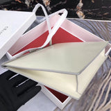 Styled lifestyle shot of statement polished women's handbag – women's statement bag