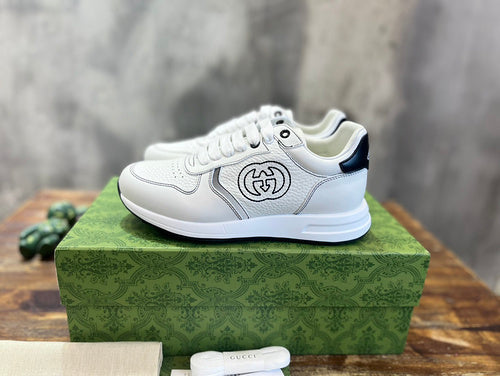 Gucci Luxury sneakers in tonal black classic court silhouette front view
