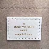 Side profile of chic modern women's handbag – women's luxury accessory