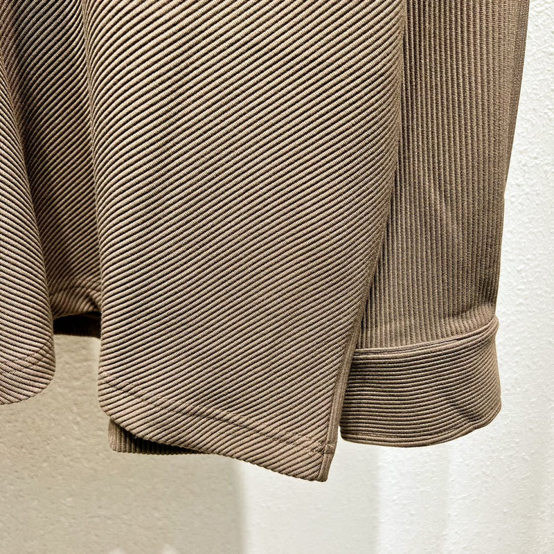 Front view of Louis Vuitton luxury clothing with monogram-inspired silhouette