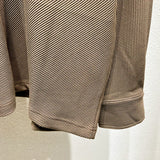 Front view of Louis Vuitton luxury clothing with monogram-inspired silhouette