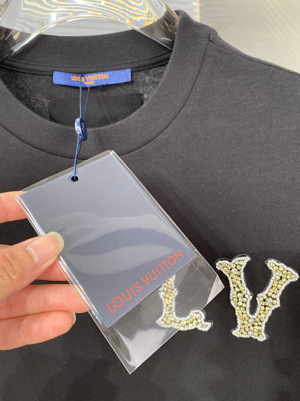 Full styled look of Louis Vuitton cotton t-shirt with streetwear-inspired cut