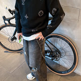 Flat lay presentation of Louis Vuitton luxury clothing with signature branding