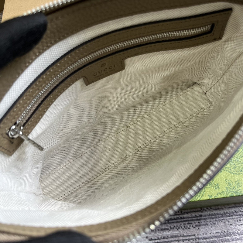 Side profile of signature everyday-luxe women's handbag – women's designer-style accessory