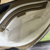 Side profile of signature everyday-luxe women's handbag – women's designer-style accessory
