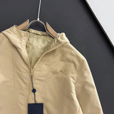 Close-up detail shot of Louis Vuitton luxury clothing with tailored silhouette
