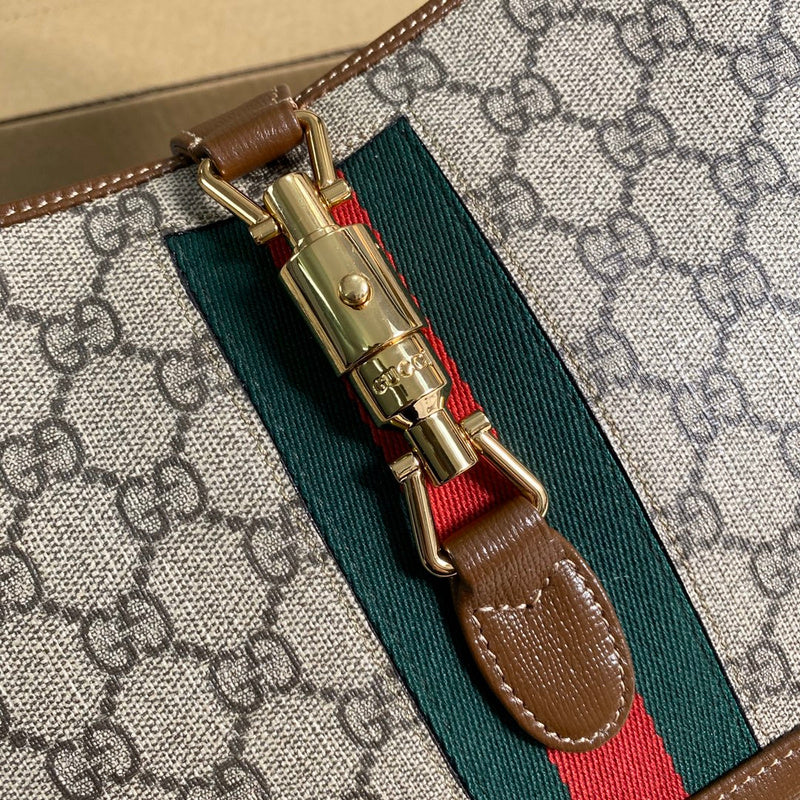Handle and strap detail of refined classic women's handbag – women's designer-style accessory