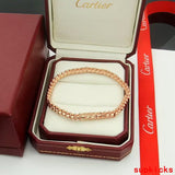 Angled view of Cartier unisex jewelry piece
