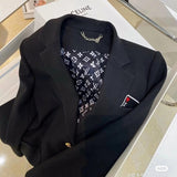 Back view of Louis Vuitton luxury clothing with logo-detail design