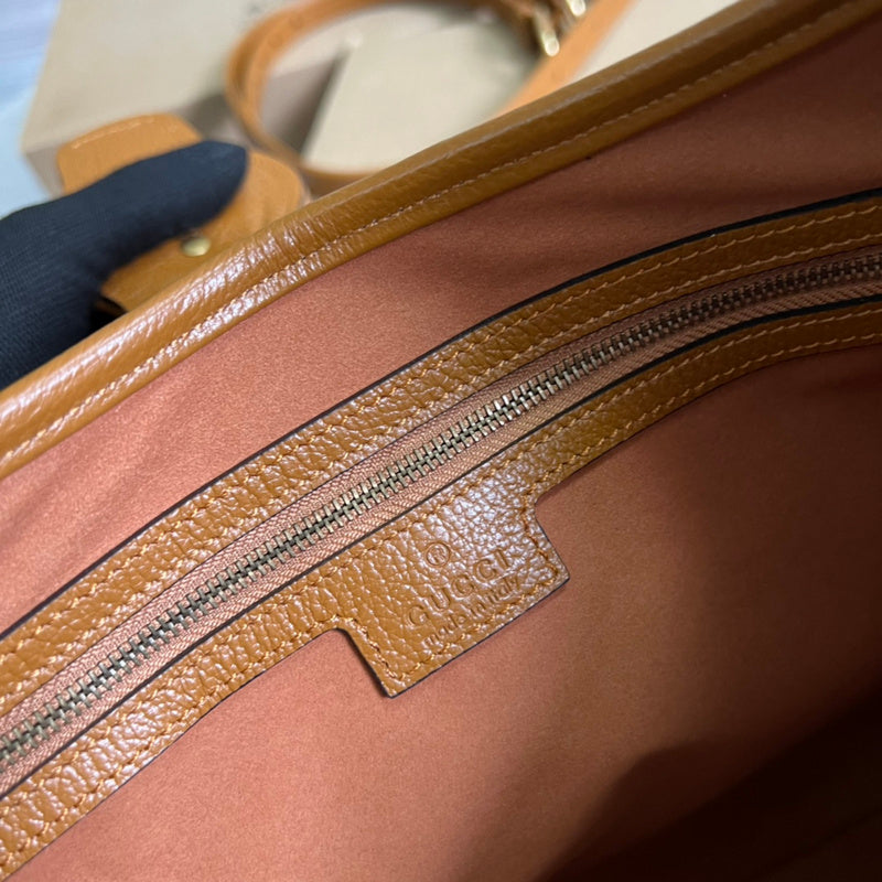 Side view of versatile structured handbag