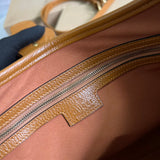 Side view of versatile structured handbag