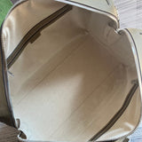 Styled lifestyle shot of everyday-luxe premium women's handbag – women's luxury accessory