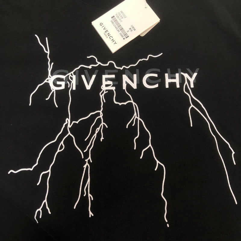 Flat lay presentation of Givenchy luxury clothing with tailored silhouette