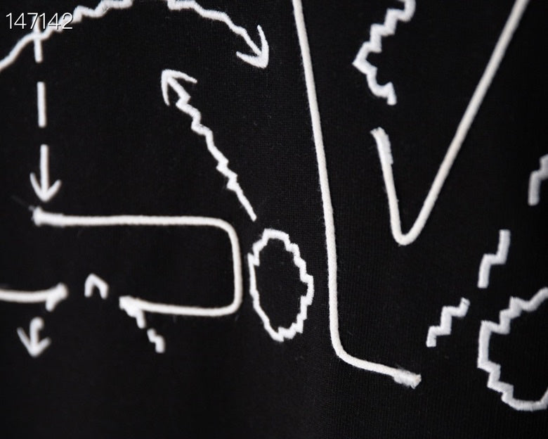 Close-up detail shot of Louis Vuitton luxury clothing with tailored silhouette