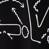 Close-up detail shot of Louis Vuitton luxury clothing with tailored silhouette
