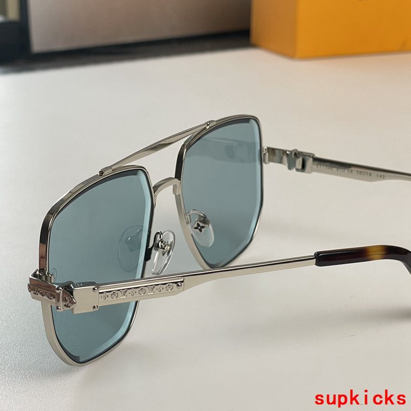 Close-up detail view of Louis Vuitton unisex sunglasses