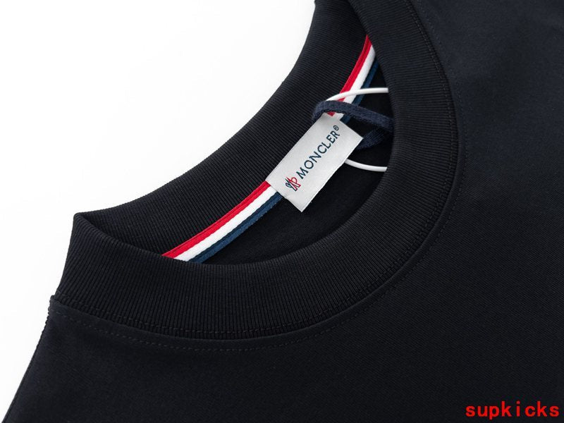 Full styled look of Moncler luxury clothing with logo-detail design