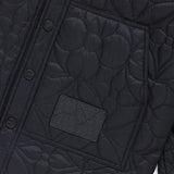 Front view of Louis Vuitton luxury clothing with monogram-inspired silhouette