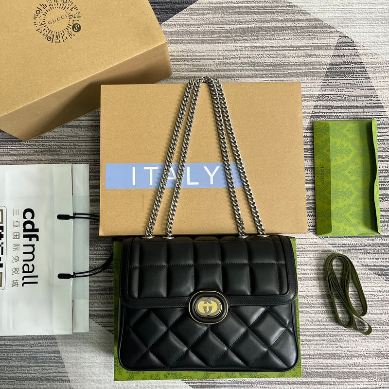 Styled lifestyle shot of statement refined women's handbag – women's statement bag