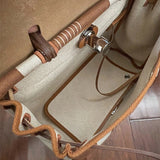 Side view of sculpted structured handbag