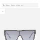 Close-up detail view of Louis Vuitton unisex sunglasses