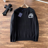 Front view of Louis Vuitton luxury clothing with logo-detail design