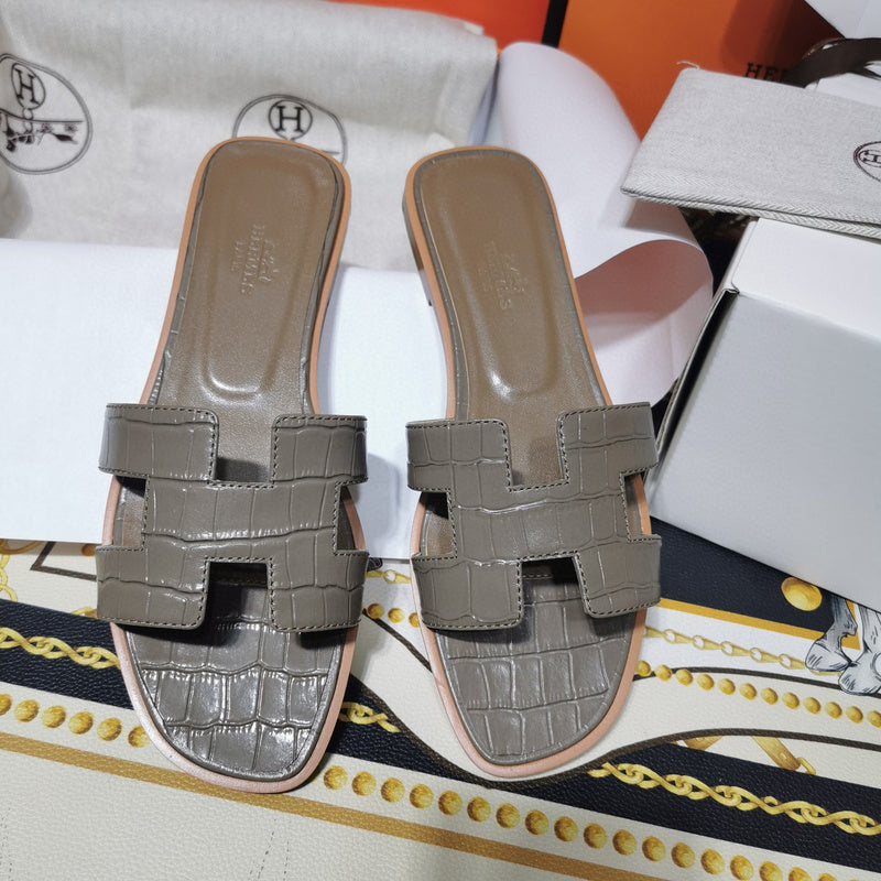 Hermes sandals Style 110 - angled studio shot