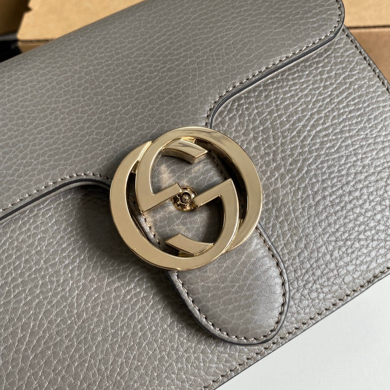 Back view of elevated sleek women's handbag – women's statement bag