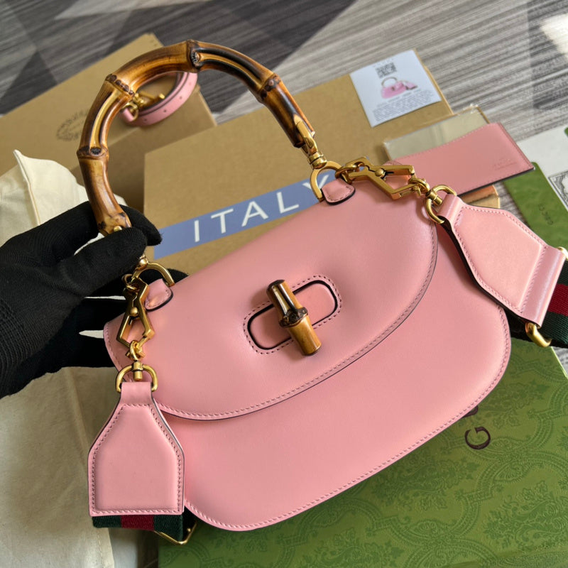Handle and strap detail of signature structured women's handbag – women's statement bag