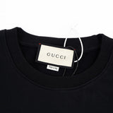 Close-up detail shot of Gucci luxury clothing with tailored silhouette