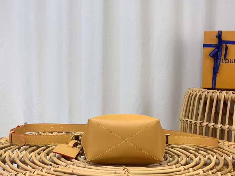 Side profile of classic signature women's handbag – women's designer-style accessory