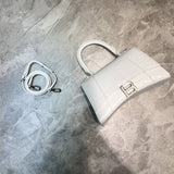 Elegant Faux Leather Handbag - Polished Finish | Women's Premium Handbag #616 - side angle view (image 2) of designer-inspired handbag