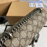 Back view of signature statement women's handbag – women's luxury handbag