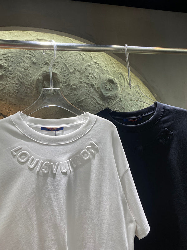 Flat lay presentation of Louis Vuitton cotton t-shirt with runway-inspired design