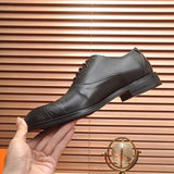 Hermes shoes Style 052 - close-up of statement logo accent
