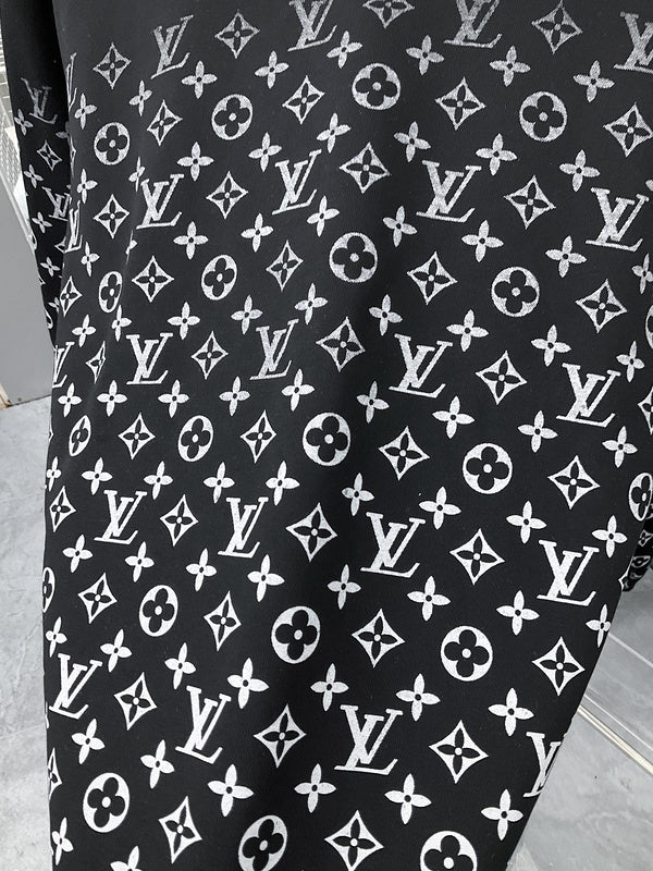 Flat lay presentation of Louis Vuitton luxury clothing with streetwear-inspired cut