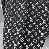 Flat lay presentation of Louis Vuitton luxury clothing with streetwear-inspired cut