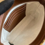 Close-up detail of signature everyday-luxe women's handbag – women's statement bag