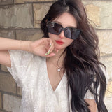Side view of Louis Vuitton unisex sunglasses
