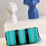 Styled lifestyle shot of everyday-luxe refined women's handbag – women's luxury handbag