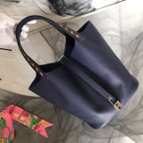 Side view of timeless structured handbag