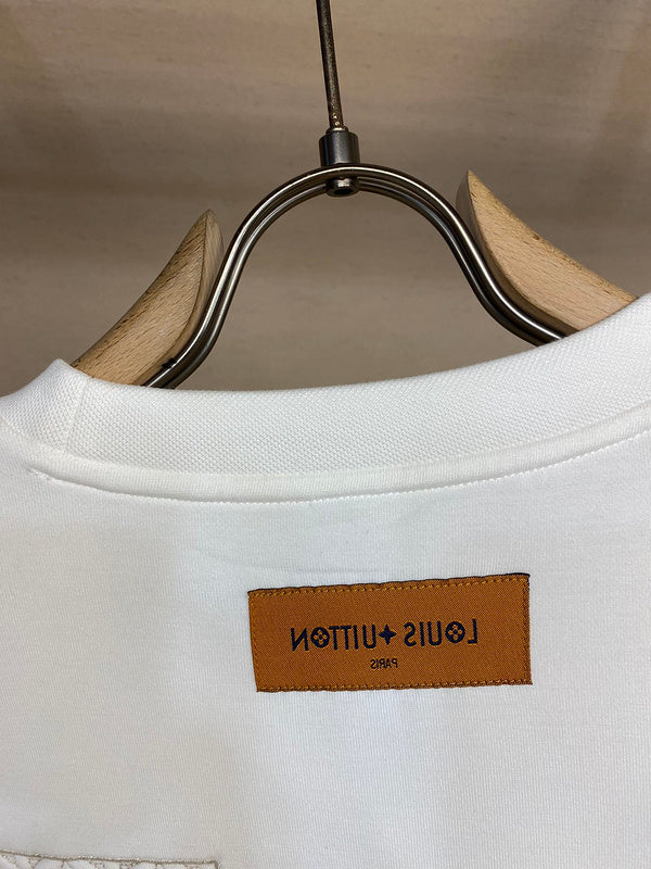 Side profile of Louis Vuitton luxury clothing with runway-inspired design