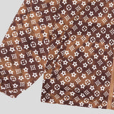 Side profile of Louis Vuitton luxury clothing with logo-detail design