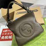 Handle and strap detail of classic statement women's handbag – women's luxury handbag