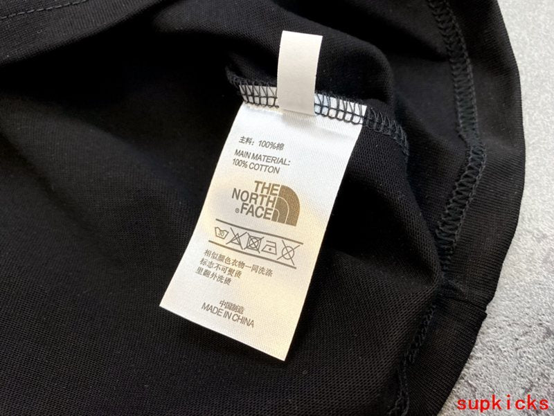 Close-up detail shot of Rhude luxury clothing with streetwear-inspired cut